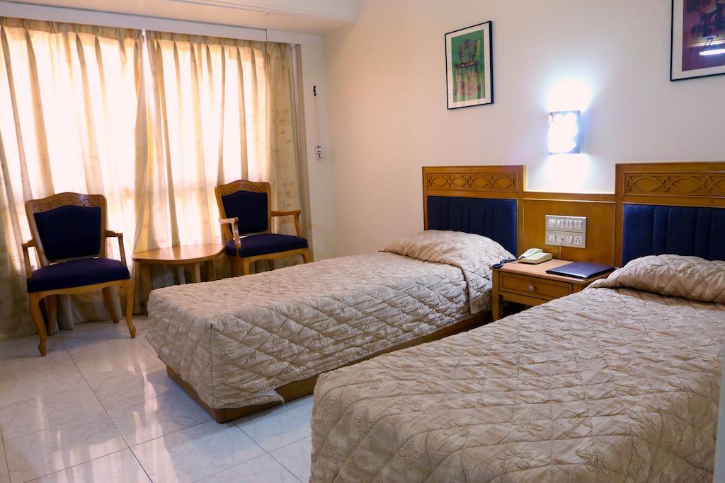 The Ambassador Hotel Pune Quarto foto